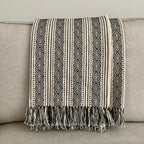 ARI fringed cotton throw