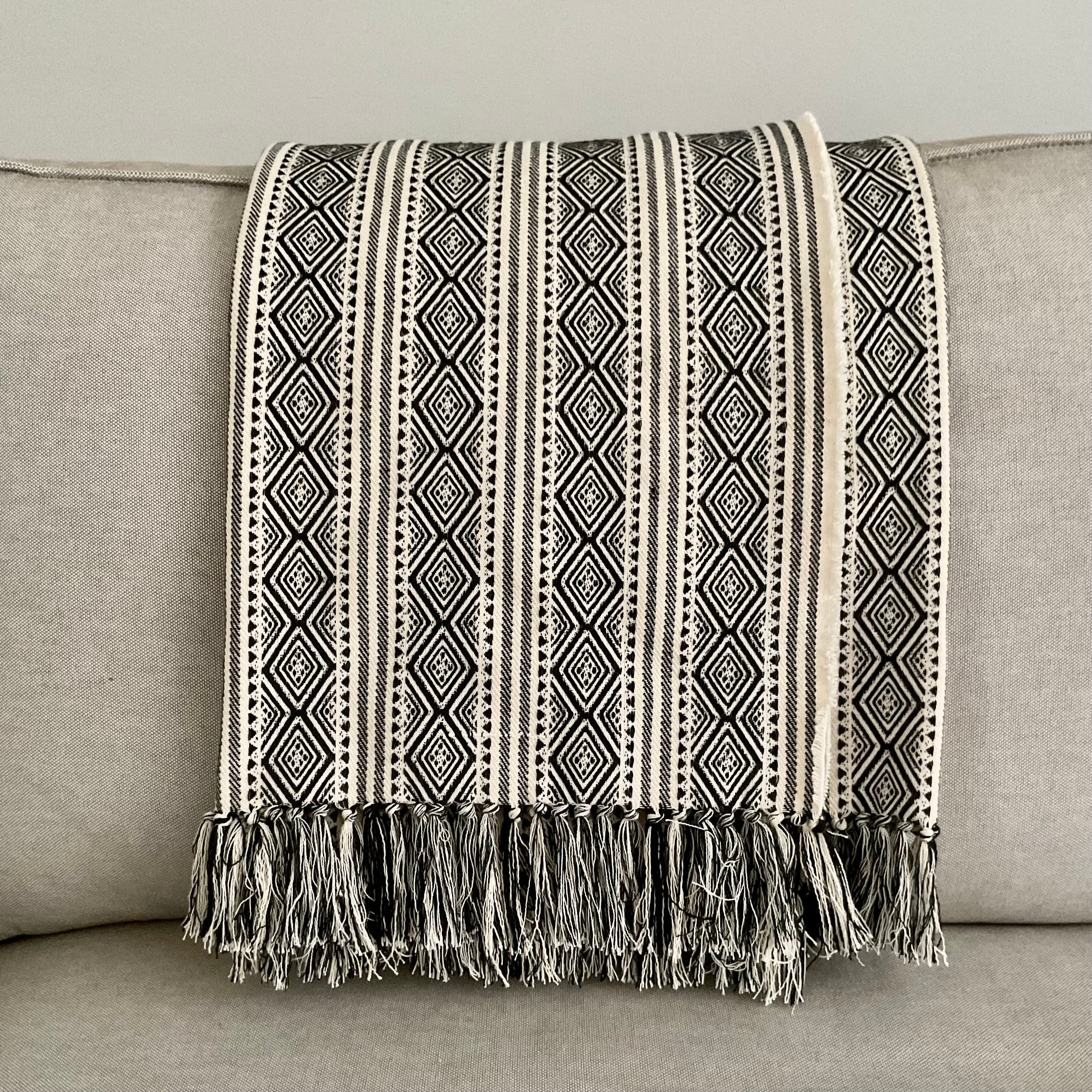 ARI fringed cotton throw